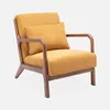 A single ocher cord armchair with a wooden frame, shown from a three-quarter angle against a light gray background. Anteprima dell’immagine prodotto