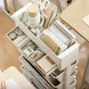 A multi-tiered organizer cart filled with office supplies, placed next to a desk. Produktbild-Vorschau