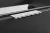 A close-up shot of a silver trim on a dark gray surface, likely a piece of furniture. Anteprima dell’immagine prodotto
