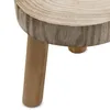 A close-up view of the top and one leg of a wooden stool. Produktbild-Vorschau