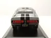 The rear view of a silver and black 1967 Ford Shelby Mustang GT 500 Eleanor model car on a black display base. Produktbild-Vorschau