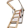A wooden attic ladder is extended from an opening in the ceiling. Podgląd zdjęcia produktu