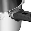 A close-up view of the handle and side of a stainless steel pot. Produktbild-Vorschau