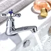A close-up shot of a chrome faucet with water running into a sink. Produktbild-Vorschau