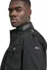 Close-up of a man wearing a black jacket. Produktbild-Vorschau