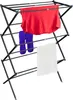 A black metal drying rack with clothes hanging on it. Podgląd zdjęcia produktu