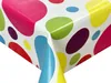 A close-up view of a tablecloth with a colorful polka dot pattern, showing the corner where two sides meet. Náhľad obrázku produktu
