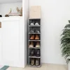 A tall, narrow shoe rack filled with various shoes, placed next to a white cabinet and a potted plant. Produktbild-Vorschau