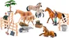 A collection of toy farm animals and accessories, including horses, a farmer, fences, a wheelbarrow, and a tree, arranged on a white background. Anteprima dell’immagine prodotto