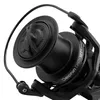 A close-up shot of a black fishing reel. Produktbild-Vorschau