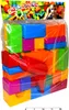 A package of colorful building blocks for children, with a boy in the background. Podgląd zdjęcia produktu