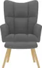 A gray armchair with wooden legs on a white background. Produktbild-Vorschau
