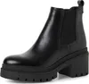 A black leather chelsea boot with a chunky sole and heel, shown from the side against a white background. Produktbild-Vorschau