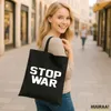 Huuraa Jutebeutel Stop War 10 Liter Black Baumwolle Tasche Produktbild-Vorschau 2