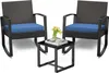 A set of outdoor furniture including two rocking chairs and a small table, with a vase of yellow flowers on the table. Produktbild-Vorschau