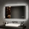 A modern bathroom vanity with a sink, faucet, and a large illuminated mirror. Anteprima dell’immagine prodotto
