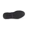 The sole of a blue shoe is shown against a white background. Podgląd zdjęcia produktu