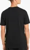 The back of a person wearing a black t-shirt. Produktbild-Vorschau