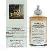 A box and bottle of Maison Margiela Replica Coffee Break Eau de Toilette. Produktbild-Vorschau