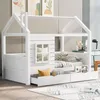 A white house-shaped bed with drawers underneath, set in a bedroom. Anteprima dell’immagine prodotto