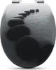 A toilet seat with a printed image of stepping stones in water. Produktbild-Vorschau