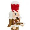 A close-up view of a gingerbread nutcracker figure. Voir les images du produit