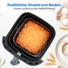 A cake is baking in an air fryer accessory, with ingredients like eggs and flour visible in the background. Produktbild-Vorschau