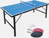 A blue mini-table tennis table with two paddles and three balls on a white background.