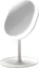 A white LED makeup mirror with a round base and a single stem. Náhľad obrázku produktu