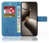 A blue flip case for a smartphone, with credit cards and euro banknotes inserted into the card slots. Produktbild-Vorschau