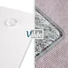 A split image showing a close-up of a clear glass cutting board with a textured pattern underneath, and a white surface with a clear bumper. The Vilde logo is also visible. Voir les images du produit