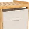 Close-up of a bamboo shelf with a fabric storage box. Podgląd zdjęcia produktu