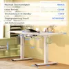 A white electric standing desk with various dimensions and features labeled. Produktbild-Vorschau