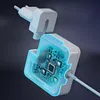 A cutaway view of a white power adapter, revealing its internal circuitry, with the plug detached. Produktbild-Vorschau