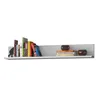 A white shelf with books and decorative items. Náhled obrázku produktu