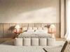 A bedroom scene with a bed, nightstands, and lamps, bathed in natural light. Produktbild-Vorschau