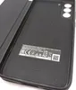 The back of a black smartphone case with regulatory information printed on it. Náhľad obrázku produktu