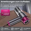 A handheld vacuum cleaner is shown charging on a wooden surface, with instructional text and feature callouts. Produktbild-Vorschau