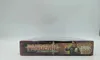 The side view of a board game box with the title 'Pandemic' prominently displayed. Voir les images du produit