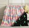 A unicorn-themed blanket is draped over a couch, with a stuffed unicorn toy beside it. Náhľad obrázku produktu