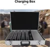 A charging case for a tour guide system is open, revealing multiple charging slots for devices. People are blurred in the background. Náhled obrázku produktu
