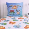 A close-up shot of Pokémon-themed bedding, including a pillow and duvet cover, displayed on a bed. Produktbild-Vorschau