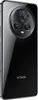 A black Honor Magic5 Pro smartphone is shown from the back, with its camera module and brand name visible. Podgląd zdjęcia produktu