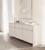 A modern sideboard in a well-lit room with sheer curtains and abstract art. Náhľad obrázku produktu