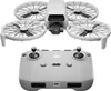 A white drone and its remote control are displayed against a white background. Produktbild-Vorschau