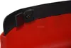A close-up view of a black clip attached to a red object with a black edge. Náhľad obrázku produktu
