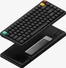 A black Nuphy Air75 V3 wireless mechanical keyboard is shown from a diagonal angle, with its base detached and lying beneath it. Produktbild-Vorschau