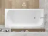A white bathtub is shown in a bathroom setting with wooden and tiled walls. Produktbild-Vorschau