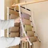 Hands are adjusting a multi-tiered hanger for pants in a closet. Produktbild-Vorschau