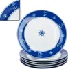 A stack of nautical-themed plates with anchors and ship wheels. Podgląd zdjęcia produktu